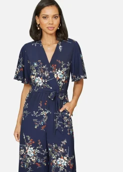 Jumpsuits & Playsuits>Mela Navy Floral Print Jumpsuit With Angel Sleeves