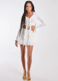 Skirts>Pink Vanilla Ivory Ruffle Slinky Mini Skirt